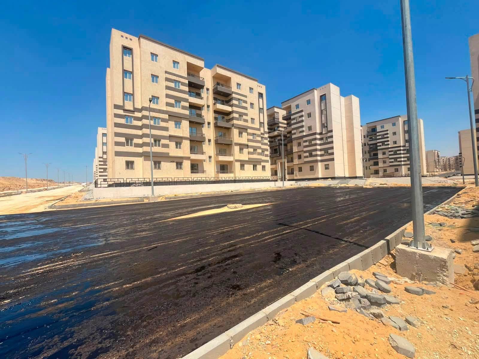 أسفلت طريق F9 وتشريب الحي 16 وشبكة كهرباء الحي 37 وصيانة الزراعة بالأحياء — صورة 3